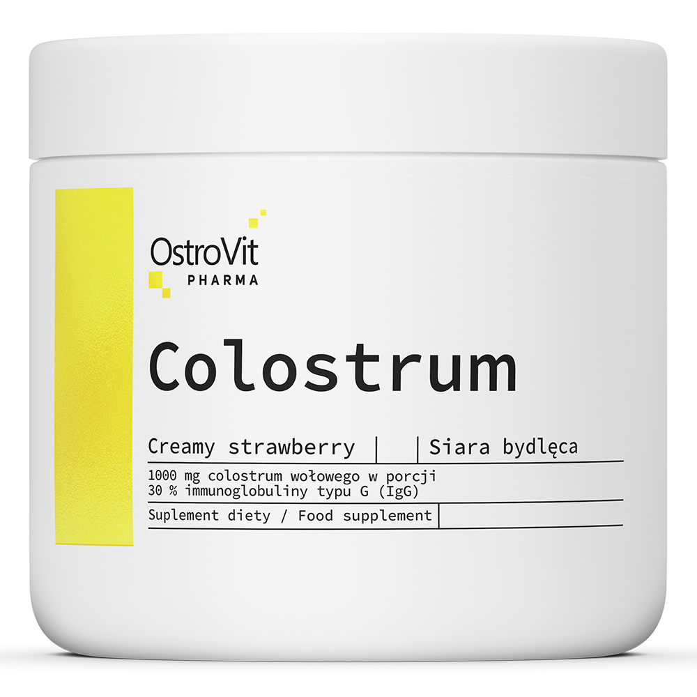 OstroVit Pharma Colostrum 100 g o smaku kremowej truskawki